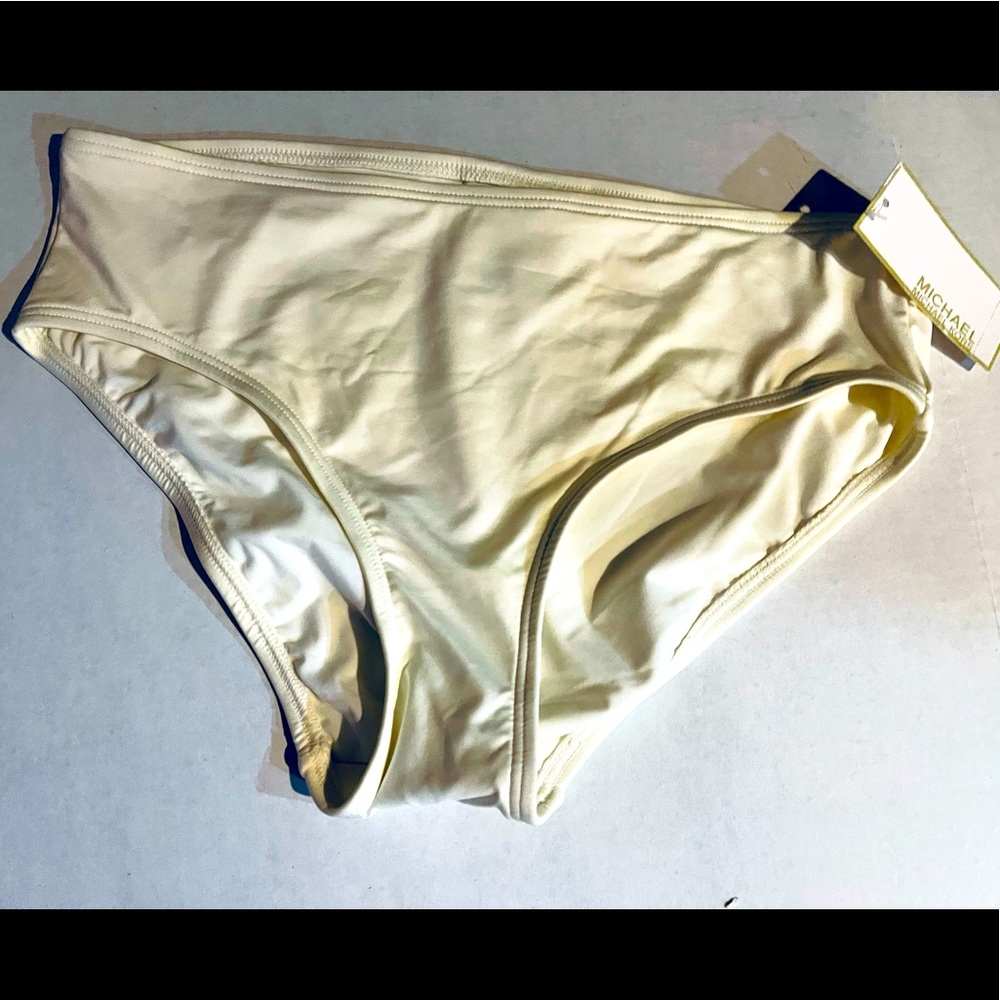 Michael Kors medium swim suit bottom. NWT. Never worn. Non smoking home.